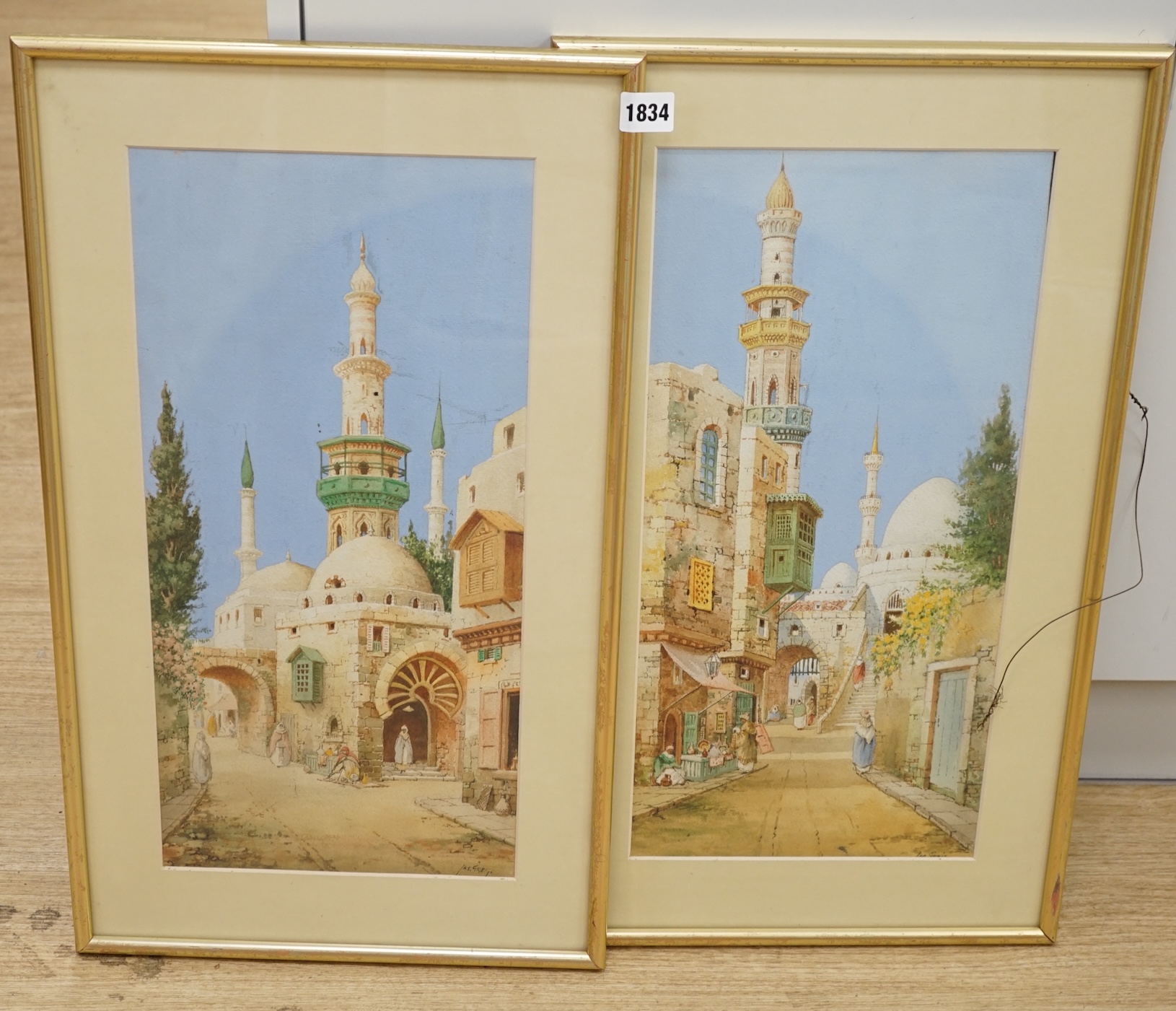 James Greig (1861-1941), pair of Orientalist watercolours, Middle eastern street scenes with mosques, each signed, 47 x 22cm. Condition - good